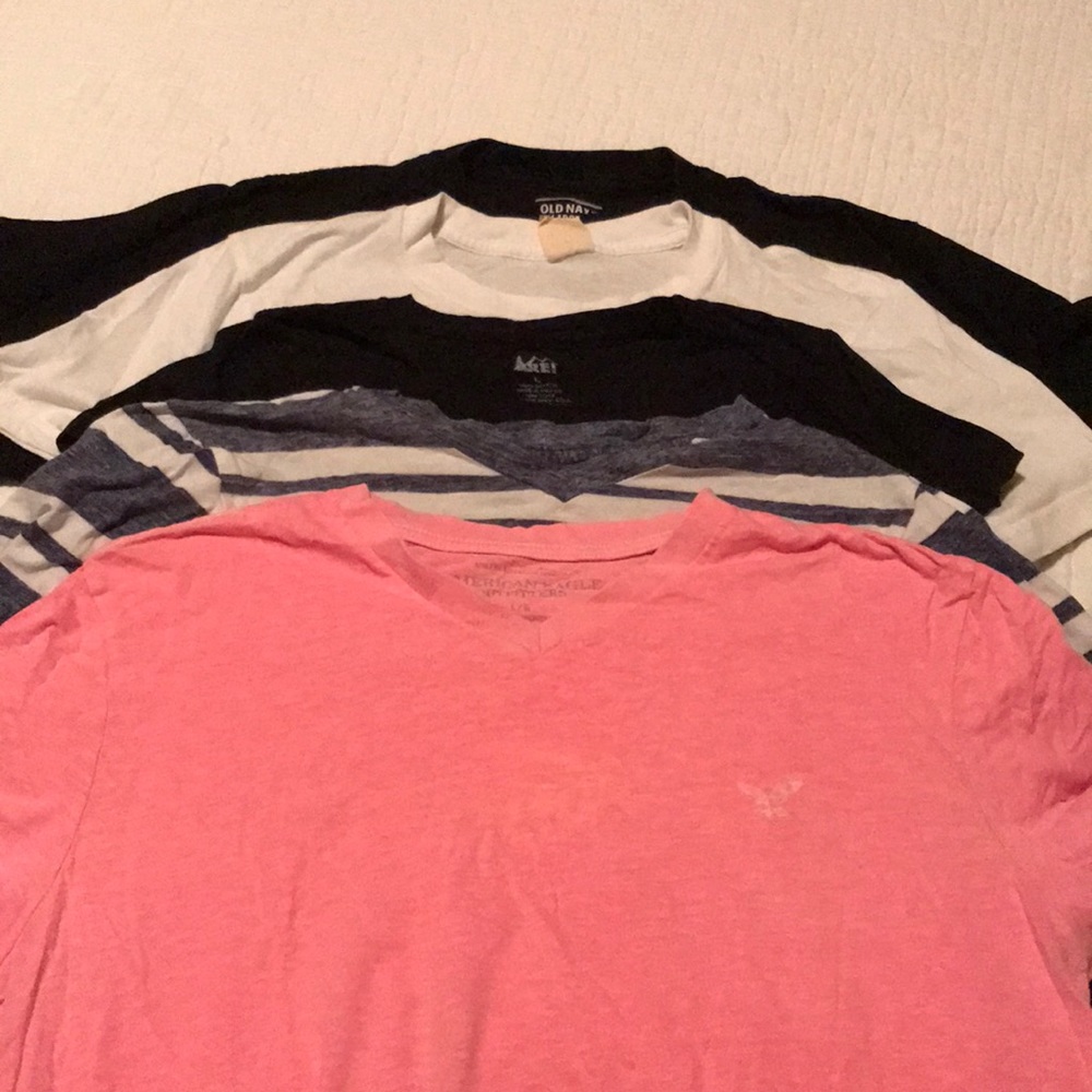 4 shirts, all extra large but 2, men’s and womens